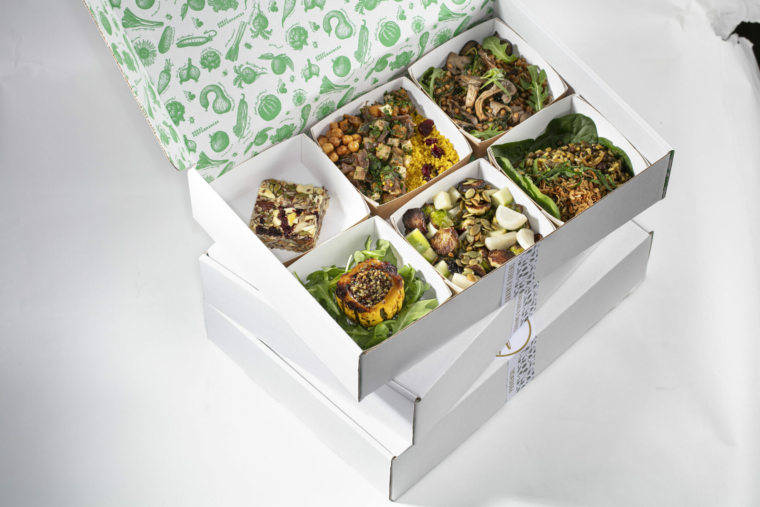 Six dishes in a six-compartment bento box